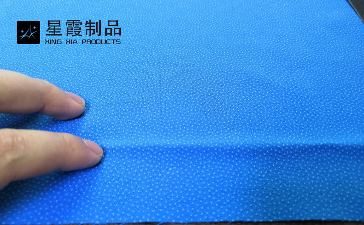 藍(lán)色針織布料熱熔膠點(diǎn)膠加工